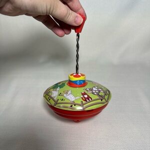 Vintage LBZ Metal Tin Spinning Top Toy in Red and Green with farm animals